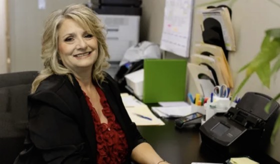 A Joanna's Bail Bonds agent at her desk