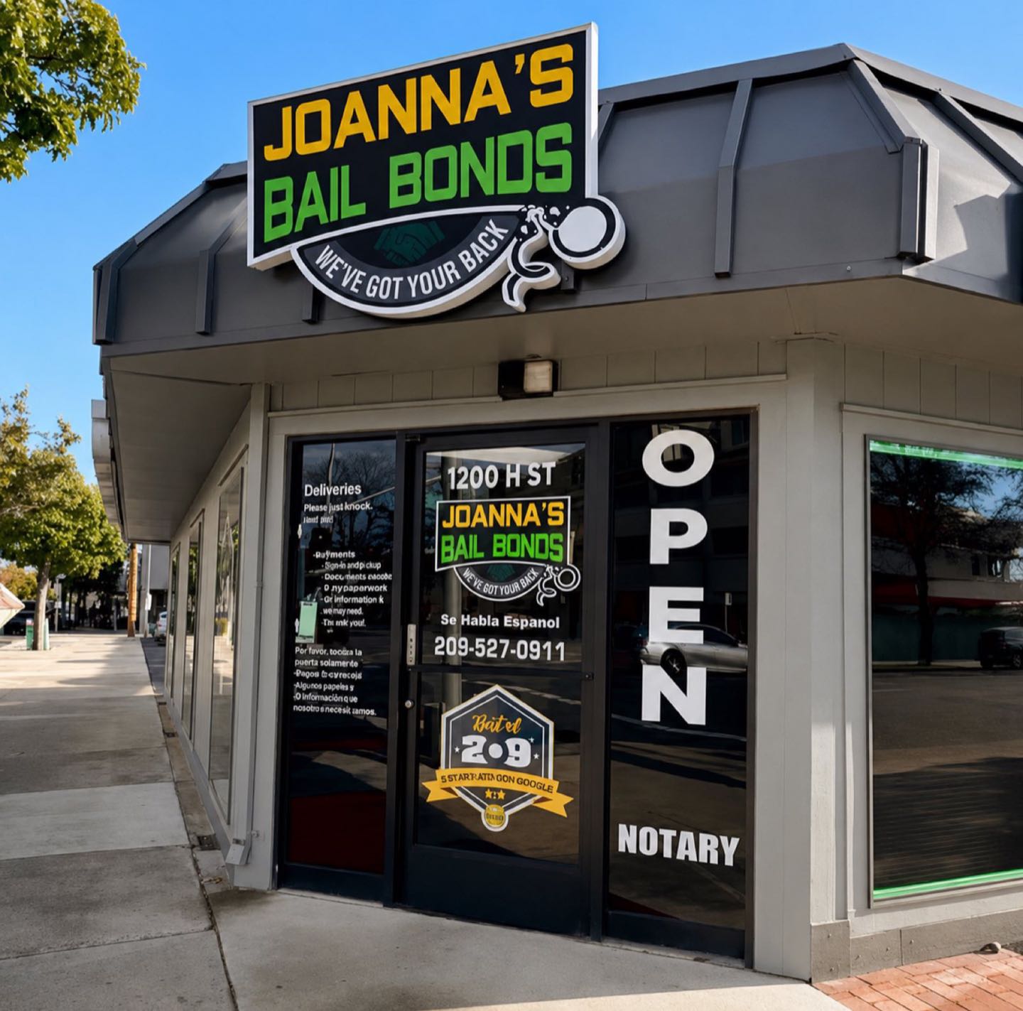 The front door of Joanna's Bail Bonds at 1200 H Street, Modesto — open 24/7